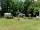 Spacious backyard with a shed, gazebo, and swing set at 507 North Dr, Cherryville, NC 28021