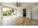 Light-filled bedroom with hardwood floors and private balcony at 8010 Litaker Manor Ct, Charlotte, NC 28270