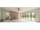 Spacious Gathering room with brick fireplace and large glass doors at 8010 Litaker Manor Ct, Charlotte, NC 28270