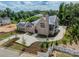 Luxury home with brick exterior, large driveway, and landscaped yard at 8010 Litaker Manor Ct, Charlotte, NC 28270
