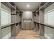 Large walk-in closet with ample shelving and hanging space at 8010 Litaker Manor Ct, Charlotte, NC 28270