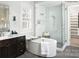 Luxurious bathroom with soaking tub, walk-in shower, and modern vanity at 129 Sleepy Cove Trl # 5, Mooresville, NC 28117