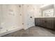 Elegant bathroom with white subway tile shower, gray floor tile, and double vanity at 3210 Timber Run Ln, Maiden, NC 28650