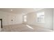 Bright bonus room with neutral carpeting and large windows at 3210 Timber Run Ln, Maiden, NC 28650