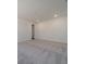 Spacious bonus room featuring neutral carpeting and natural light at 3210 Timber Run Ln, Maiden, NC 28650