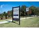 Community sign announcing new luxury residences at 5704 Heirloom Crossing Ct, Charlotte, NC 28270