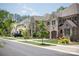 New homes for sale in a desirable neighborhood. Stone and shingle exteriors at 5704 Heirloom Crossing Ct, Charlotte, NC 28270