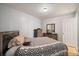 Bedroom with a double bed, dresser, and mirror at 525 Kelly Ave, Mooresville, NC 28115