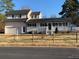 Two-story house with attached garage and a fenced yard at 525 Kelly Ave, Mooresville, NC 28115