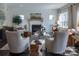Relaxing living room with a shiplap wall, fireplace, and comfortable seating at 11330 James Coy Rd # Covington, Davidson, NC 28036
