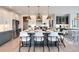 Modern kitchen with large island, white and green cabinets, and stainless steel appliances at 11330 James Coy Rd # Covington, Davidson, NC 28036