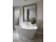 Elegant bathroom with soaking tub, walk-in shower, and modern fixtures at 11330 James Coy Rd # Covington, Davidson, NC 28036