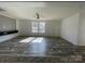 Open living room showcasing hardwood floors and neutral colors at 5433 King Wilkinson Rd, Denver, NC 28037