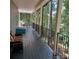 Spacious deck overlooking wooded area with seating at 3645 Lake Bluff Dr, Sherrills Ford, NC 28763