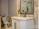 Bathroom with marble vanity and toilet at 3645 Lake Bluff Dr, Sherrills Ford, NC 28763