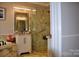 Spa-like bathroom with marble shower and vanity at 3645 Lake Bluff Dr, Sherrills Ford, NC 28763
