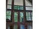 Interior view with large windows and double doors leading to a patio at 3645 Lake Bluff Dr, Sherrills Ford, NC 28763