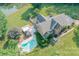 Home with pool and gazebo near a pond at 1228 Brawley School Rd, Mooresville, NC 28117