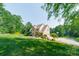 Two story home with attached garage and manicured lawn at 1228 Brawley School Rd, Mooresville, NC 28117