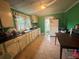 Bright kitchen featuring ample counter space and cabinets at 418 Hill St, Monroe, NC 28110