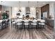 Modern kitchen with two-toned cabinetry, large island, and gold pendant lighting at 11318 James Coy Rd # Devonshire, Davidson, NC 28036