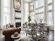 Spacious living room with high ceilings, a fireplace, and ample natural light at 11318 James Coy Rd # Devonshire, Davidson, NC 28036