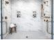Large walk-in shower with marble tile and dual shower heads at 11318 James Coy Rd # Devonshire, Davidson, NC 28036