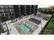 Luxury apartment building with a rooftop pool and grilling area at 9901 Benfield Rd # 322, Charlotte, NC 28269