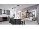 Modern kitchen with island and stainless steel appliances at 9901 Benfield Rd # 322, Charlotte, NC 28269