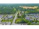 Aerial view of a residential neighborhood with houses, roads, and green spaces at 2374 Rock Hill Church Rd, Concord, NC 28027