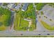 Aerial view of a mobile home on a lot near roads and businesses at 2374 Rock Hill Church Rd, Concord, NC 28027