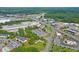 Aerial view of vacant land near restaurants and a large distribution center at 2374 Rock Hill Church Rd, Concord, NC 28027