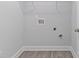 Laundry closet with vinyl flooring and hookups at 1030 Heath Helms Rd, Monroe, NC 28110