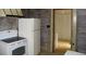 White appliances and wood paneled walls in the kitchen at 2369 Buffalo Shoals Rd, Statesville, NC 28677