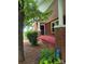 Brick house exterior with a red porch and black railing at 4210 Old Beatty Ford Rd, China Grove, NC 28023