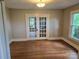 Dining room with hardwood floors and French doors at 4210 Old Beatty Ford Rd, China Grove, NC 28023