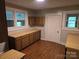 Kitchen with wood cabinets, butcher block countertops, and hardwood flooring at 4210 Old Beatty Ford Rd, China Grove, NC 28023
