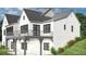White brick home with large deck and balcony at 1518 Billy Howey Rd # 6, Waxhaw, NC 28173