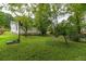 Side of house with basketball goal and yard at 440 N Oakland Ave, Statesville, NC 28677