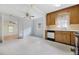 Kitchen with wood cabinets and access to dining area at 440 N Oakland Ave, Statesville, NC 28677