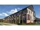 Townhome building exterior, showcasing modern design and landscaping at 3024 Khan Park Dr # 65, Charlotte, NC 28206