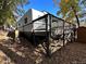 Lakefront property with large deck and trailer at 112 Sycamore St, New London, NC 28127