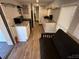 Modern kitchen with white cabinets and granite countertops at 112 Sycamore St, New London, NC 28127