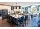 Modern kitchen with a large island and breakfast bar, open to a sunroom at 841 Lake Forest Dr # Hawthorne, Belmont, NC 28012