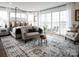 Spacious main bedroom with a comfortable sitting area and access to private deck at 841 Lake Forest Dr # Hawthorne, Belmont, NC 28012