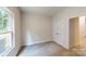 Bright bedroom with window, double-door closet, and carpet at 230 Hamrick Rd # 2, Cramerton, NC 28032