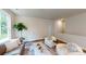 Spacious living room with a view, neutral decor, and two armchairs at 230 Hamrick Rd # 2, Cramerton, NC 28032