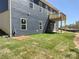 Rear view of house showing deck and backyard at 230 Hamrick Rd # 2, Cramerton, NC 28032