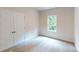 Bedroom with double-door closet and a window at 230 Hamrick Rd # 2, Cramerton, NC 28032