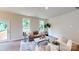 Cozy living room with large windows and a comfy couch at 230 Hamrick Rd # 2, Cramerton, NC 28032